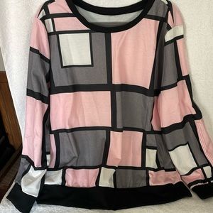 Woman’s long sleeved polyester top